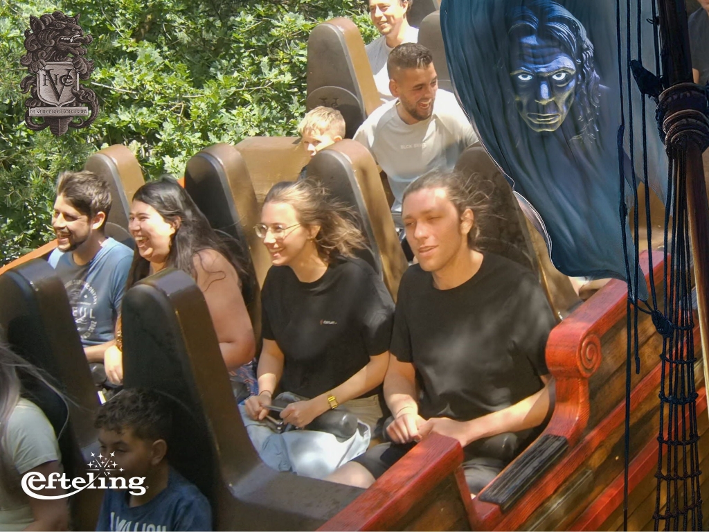 Itenium team members and their families experiencing the thrill of a water ride at Efteling, showcasing the excitement and fun of the company's family day adventure.