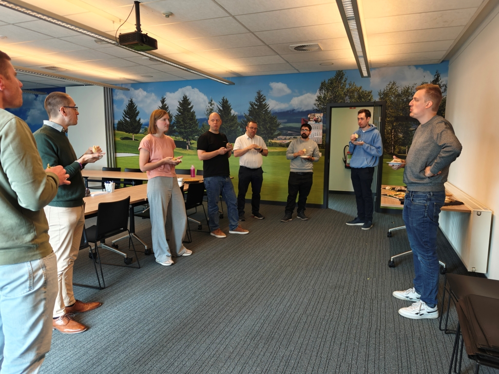 Software professionals enjoying a collaborative break during an Office Day, fostering team bonding and informal knowledge exchange. This demonstrates a vibrant developer community and team-building atmosphere.